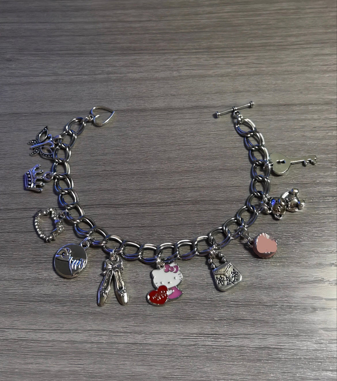 Silver HK 10 Charm Mystery Bracelet 🚨50% off Black Friday Sale🚨🍂